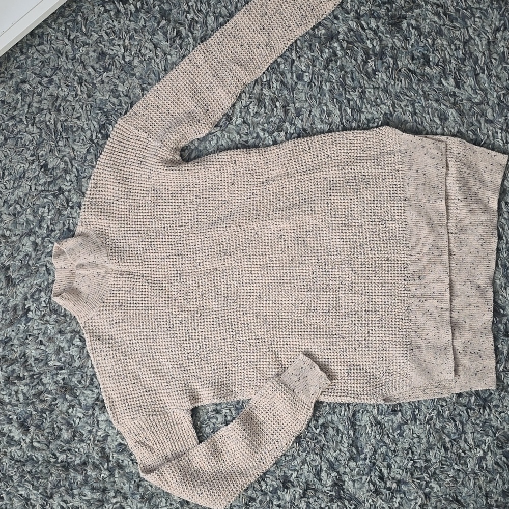 Long knitted sweater